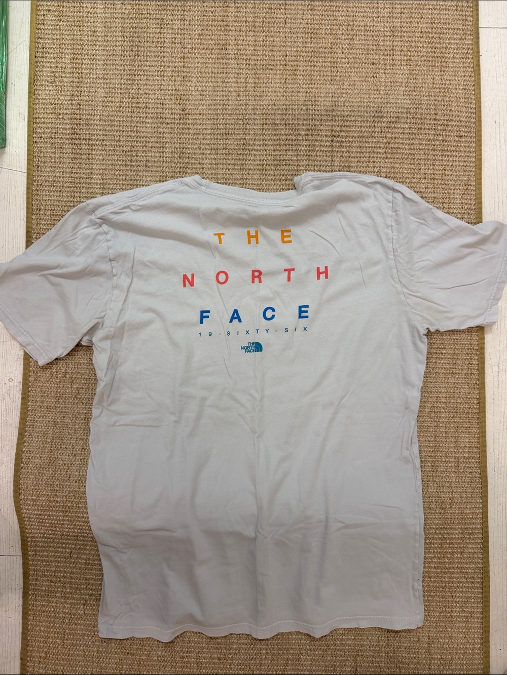 The North Face Men's Short Sleeve Logo Tee - Light Blue with Multicolor Text